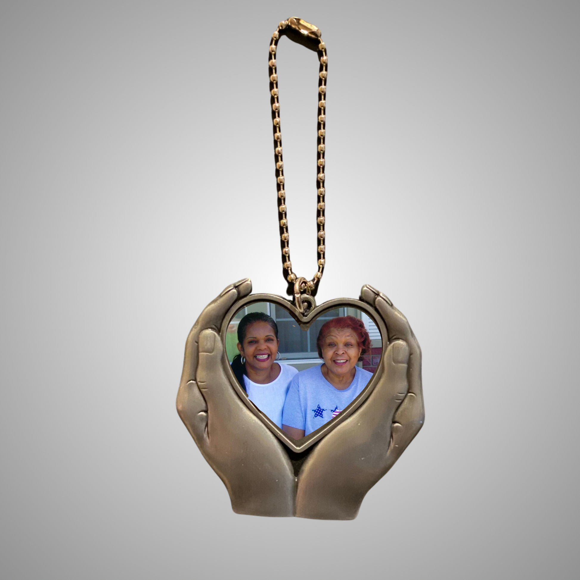Heart in Hands pendant